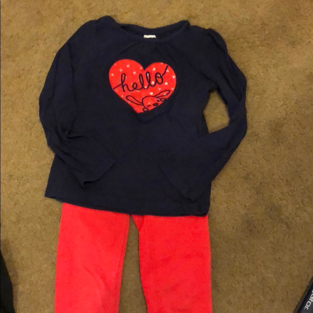 1 pair of red pants and 6 matching shirts.